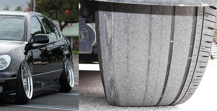 Hình ảnh một lốp xe bị mòn không đều do áp suất không đúng