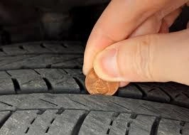Dùng đồng xu để kiểm tra độ mòn của lốp xe