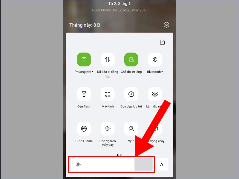Màn hình cài đặt độ sáng trên điện thoại với thanh trượt được điều chỉnh ở mức thấp, bên cạnh là biểu tượng chế độ tối.
