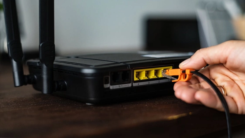 xem thử các đèn báo và nhấn nút khởi động lại router